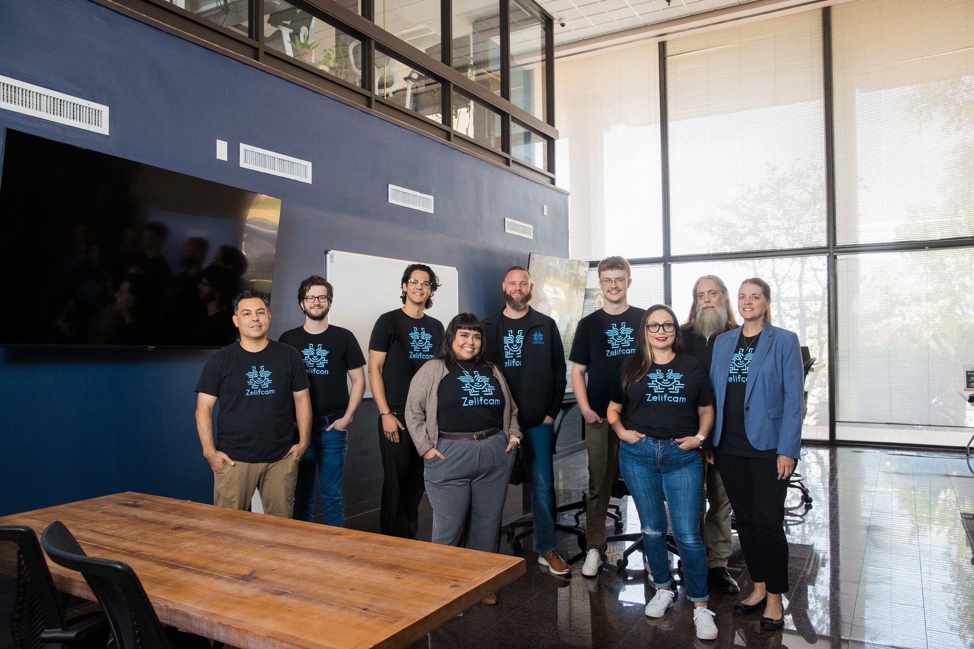 The Zelifcam team standing together in the San Antonio office